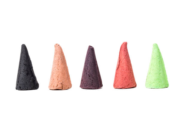 Colorful Incense Cones Isolated on White Background.