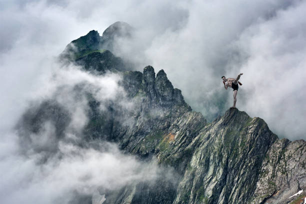 istock Martial artist training in mountains 871778932