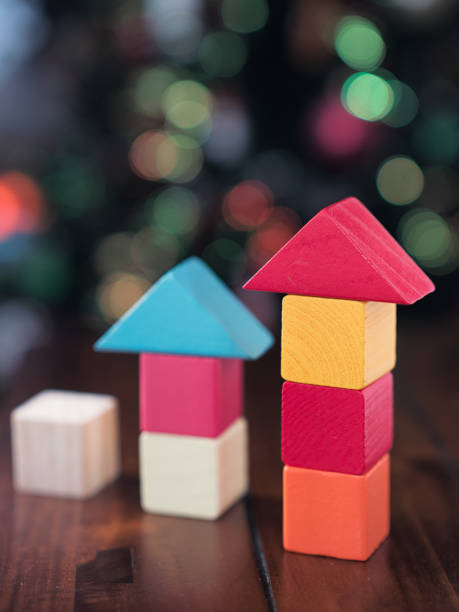 istock Increasing toy block arrow against blur background 871789876