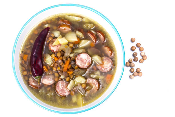 istock Vegetable soup with chickpeas and smoked sausages 871789944