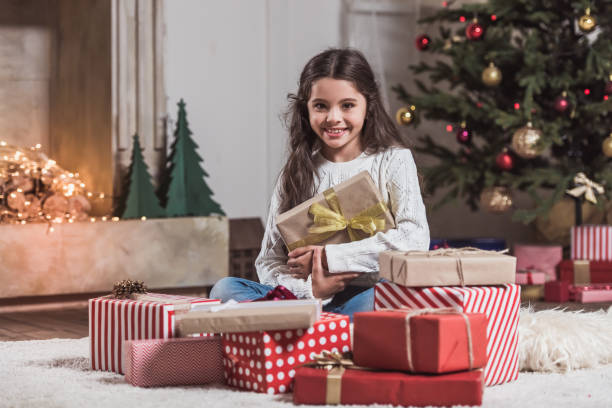 istock Happy New Year! Girl with presents 871802436