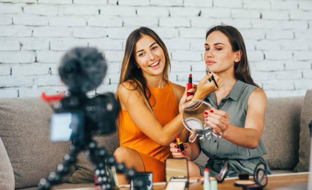 istock Vloggers reviewing make-up products 871808152