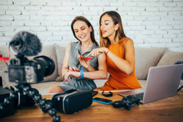 istock Two women reviewing smart watches 871808160