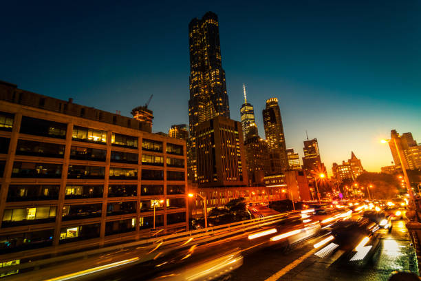 A high angle view of downtown Toronto, illuminated at night, defocused in-camera for use as a generic modern city background.