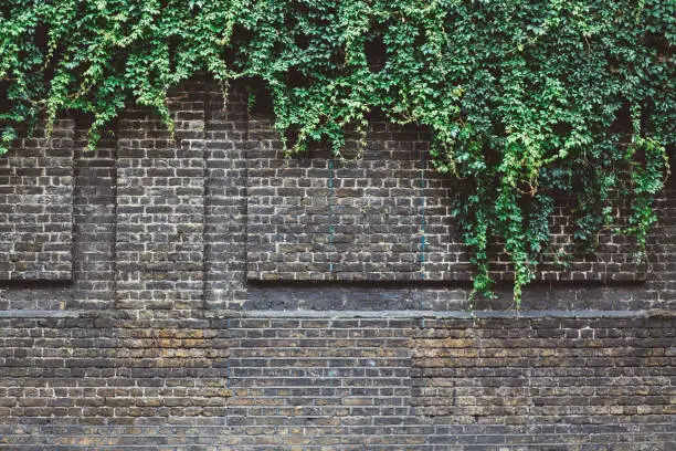 Old brick wall in London, England, somewhere near the East End, Shoreditch district.
