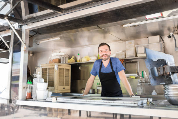 istock Food truck owner ready to work 871819422