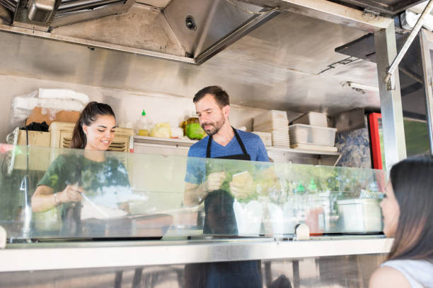 istock Workers in a food truck 871819506