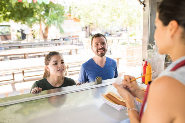 istock Customers ordering from food truck 871822802