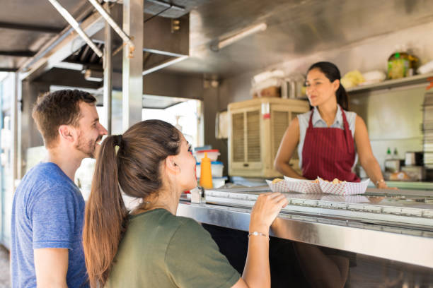 istock Customers making line in a food truck 871822830