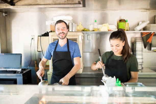 istock Handsome chef in a food truck 871823042