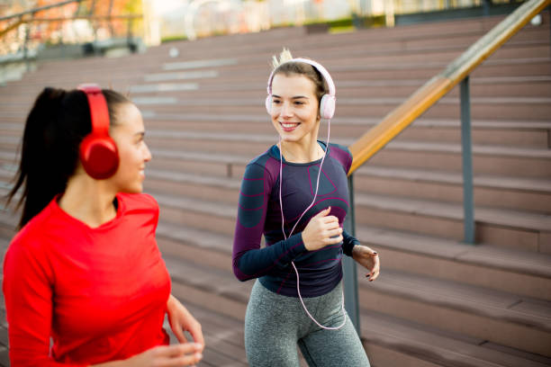istock Young women running in urban area 871823968