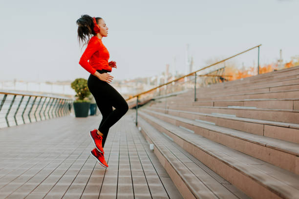 istock Young woman exercising outside 871823972