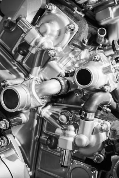 istock Shiny V12 car engine fragment, closeup photo 871824232