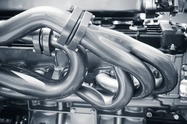 Photo of Shiny exhaust pipes. V12 Motor parts