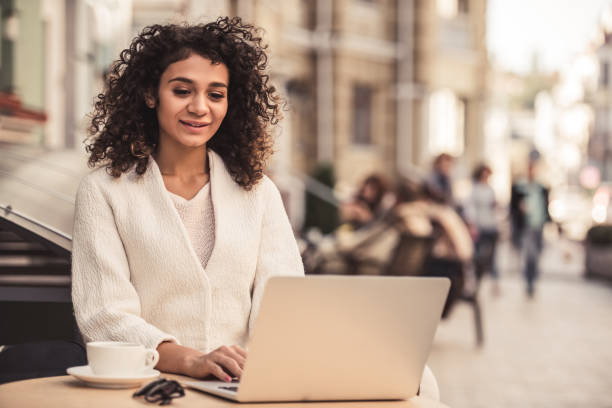 istock Young woman in city 871824478