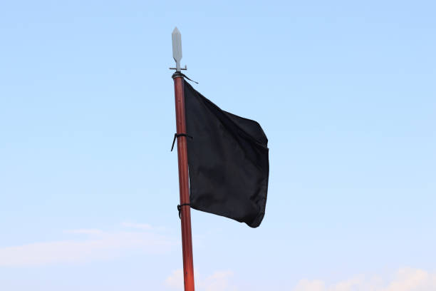 istock The black flag flying in the wind. 871827176