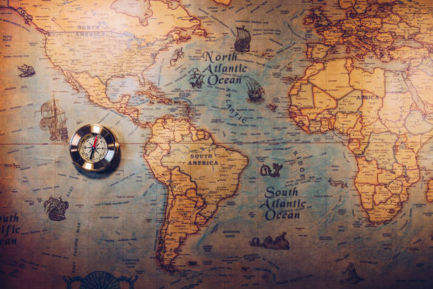 Columbus day and world map with compass Columbus day and world map with compass columbus stock pictures, royalty-free photos & images