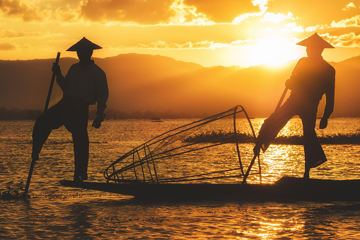 Inle Lake Intha fisherman at sunset in Myanmar (Burma).