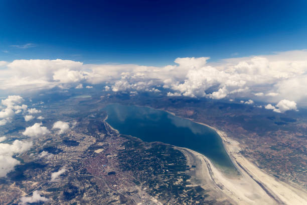 istock Clouds and Sky as Seen Through Window of an Aircraft 871831370