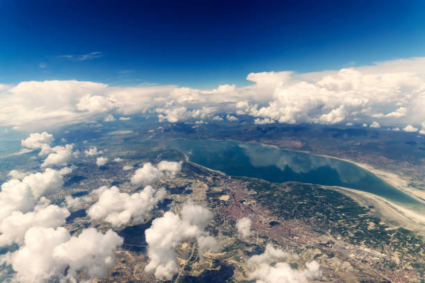 istock Clouds and Sky as Seen Through Window of an Aircraft 871831380