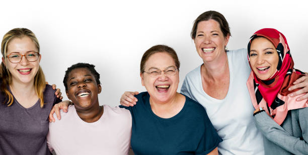 Group of women feminism togetherness smiling teamwork Group of women feminism togetherness smiling teamwork arm around stock pictures, royalty-free photos & images