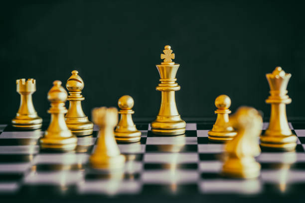 istock Strategy chess battle Intelligence challenge game on chessboard. Success the strategy concept. Chess business leader and success idea. Chess strategy game business competition success play. 871837830