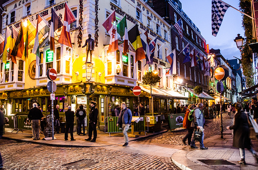 Corner of Oliver St-John Gogarty's pub  in Dublin during evening of autumn\n