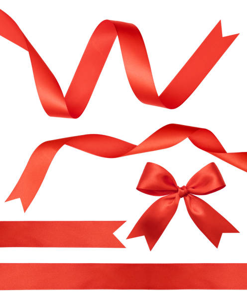 istock Shiny red satin ribbons on white background 871859870