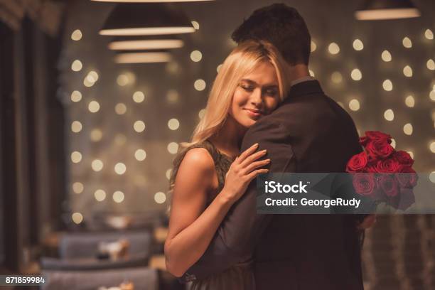 Couple On A Date Stock Photo - Download Image Now - Couple - Relationship, Boyfriend, Embracing