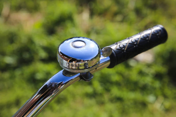 istock Bell of the bicycle on green lawn 871863448
