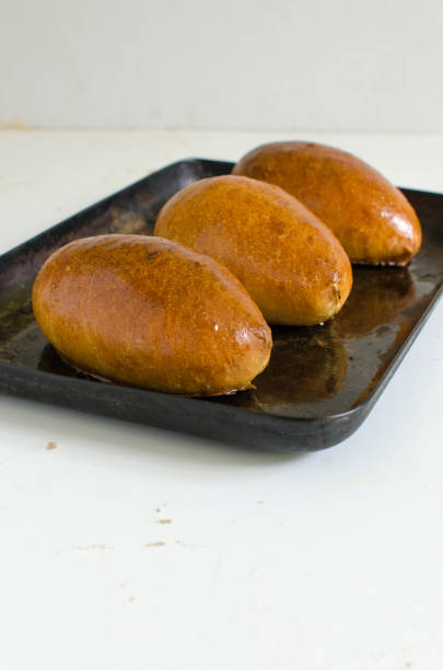 istock Homemade pies stuffed with rice, eggs and green onions 871864352