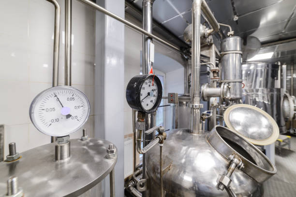 istock Pressure gauges. Alcohol distillation equipment 871868008