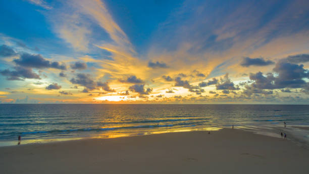 istock sunset above Naka snake sculpture at Karon beach 871880892