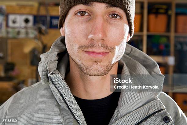 A Young Male Skier Standing In His Gear Room Stock Photo - Download Image Now - Montana - Western USA, People, 25-29 Years