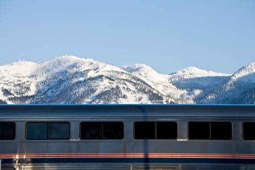 A train passes in front of the Whitefish Mountain Ski Resort.