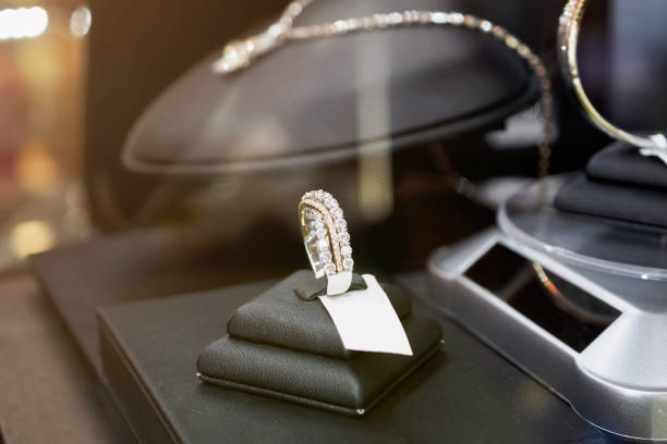 istock Diamond rings in jewelry luxury store window display 871885552