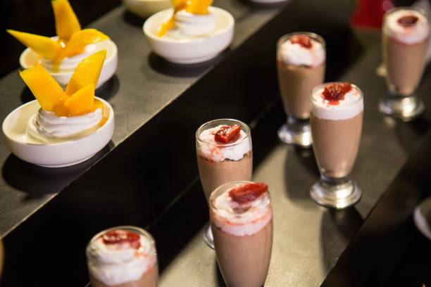 istock Variation of desserts in glasses 871885798