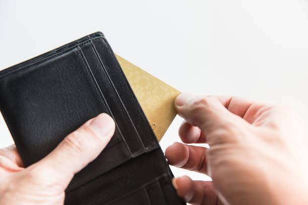 istock Pull Plastic Card out of Pocket Pay Money Using Credit Card Payment from Wallet without Cash Concept 871892818