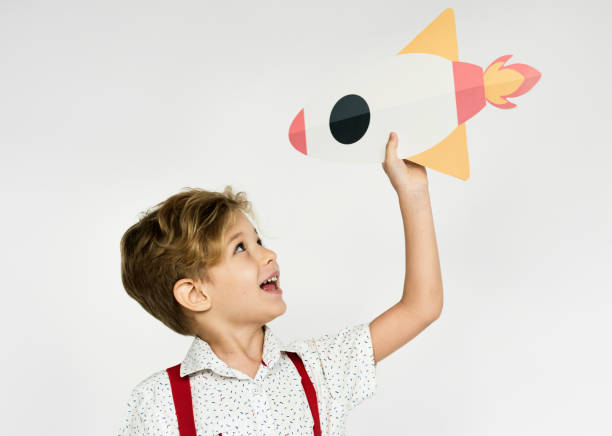 istock Portrait of a boy with a rocket 871897096