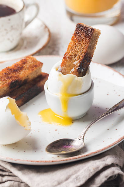 boiled eggs and crispy toasts