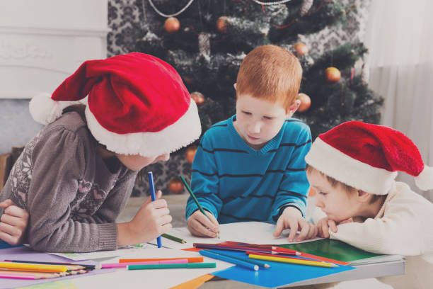 istock Children writing letter to santa, wait for christmas 871900498