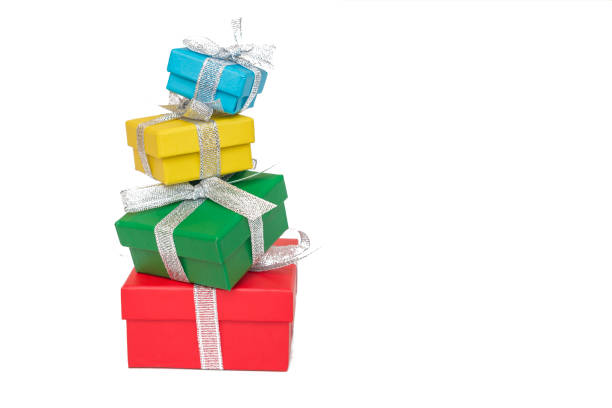 istock Gift multicolored boxes wrapped in recycled paper with ribbon isolated on white 871901006