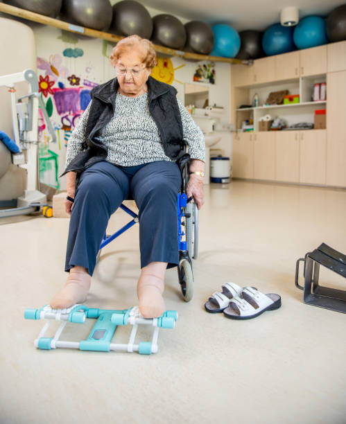 istock Senior Woman Doing a Physiotherapy Exercise in Retirement Home 871901574