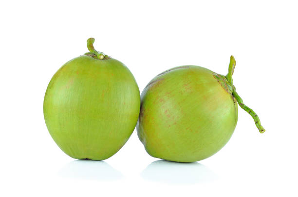 istock Green coconut fruit isolated on white background 871904638