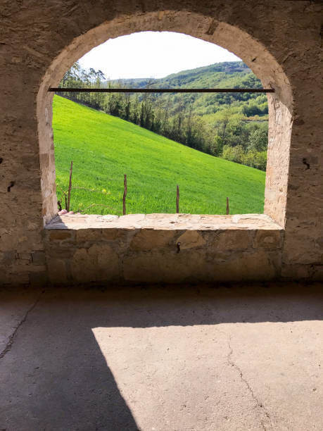 istock stone arch like a window on the hills 871911858