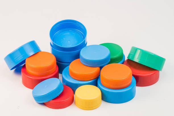 istock Plastic bottle screw caps isolated on white 871916310