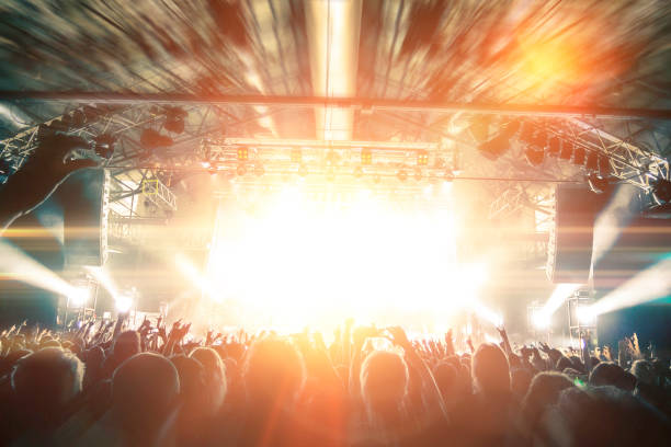 istock Concert crowd in front of a live stage 871916458