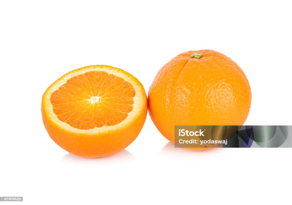 whole and half cut fresh Navel/Valencia orange on white background Valencia Orange Stock Photo
