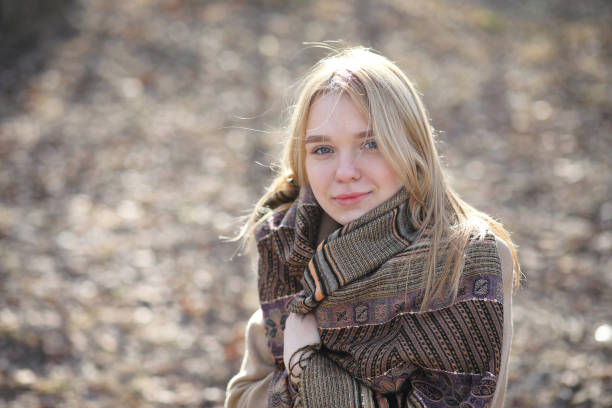 istock Cute blonde in a city park 871920390