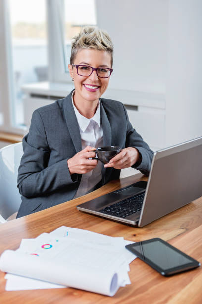 istock Businesswoman working on a laptop 871924156